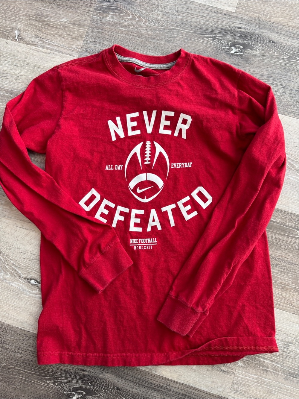 Nike Kids Red Long-Sleeve 'Never Defeated' Graphic Tee